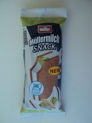 Muller Baton pufos cu umplutura de nuca de cocos si fistic