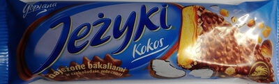 Herbatnik z karmelem 37,3%, wiórkami kokosowymi, orzechami laskowymi i chrupkami ryżowymi w czekoladzie mlecznej. Jeżyki